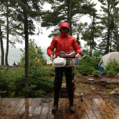 Rob Gorski geared up for dish duty on a rainy morning